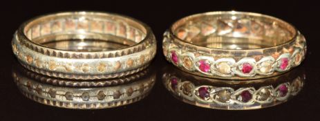 Two 9ct gold eternity rings set with synthetic stones, 6.9g, size S