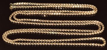 A c1900 9ct rose gold guard chain made up of circular links, 39g, 148cm