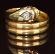 Victorian yellow metal serpent ring set with a rose cut diamond and ruby eyes, 10g, size T