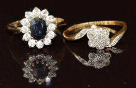 An 18ct gold ring set with diamonds in a floral platinum cluster (2g, size J) and a 9ct gold ring