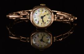 Unnamed 9ct gold ladies wristwatch with blued hands, black Arabic numerals, mother of pearl dial and