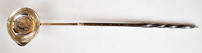 Georgian whalebone handled toddy ladle, with 1750 Prussian silver coin set to base and engraved