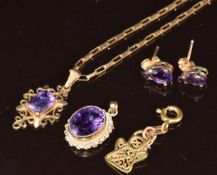 A 9ct gold chain made up of rectangular links, two 9ct gold pendants set with amethysts, a pair of