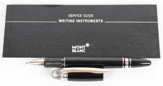 Montblanc Starwalker ballpoint pen with black body and platinum plated fittings, with Service Guide.
