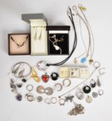 A collection of silver jewellery including Ola Gorie brooch, fifteen pairs of earrings, seven