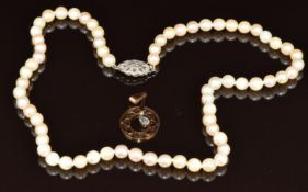 A single strand of pearls with 9ct white gold clasp set with a diamond (44cm, 21g) together with a