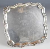 Walker & Hall Edward VIII hallmarked silver card tray or salver with shaped edge, raised on four