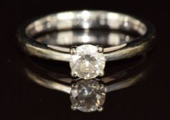 An 18ct gold ring set with a round cut diamond of approximately 0.38ct, 2.7g, size K