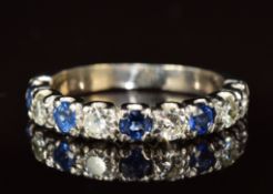 An 18ct gold half eternity ring set with sapphire and diamonds, each approximately 0.1ct, 4.4g, size