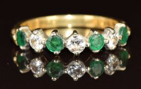 An 18ct gold ring set with emerald and diamonds, 3g, size P