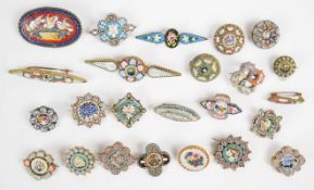 Twenty-three c1900 micro mosaic brooches including one in the form of a shoe and one 'Roma'