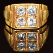 Yellow metal ring set with four cubic zirconia (tests as 18k gold), 13g, size Y