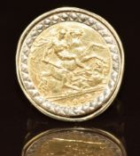 A 9ct gold ring set with a 1982 gold half sovereign, 7g, size O