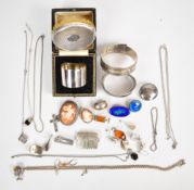 A collection of silver jewellery including pressed amber pendant and earrings, five chains, three