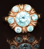 A 10k gold ring set with zircons in a circular setting, 2.8g, size M