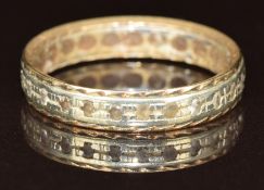 A 9ct bi-coloured eternity ring set with paste, 2.5g, size Q