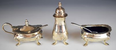 Elizabeth II hallmarked silver three piece cruet set with blue glass liners, Birmingham 1959/60,