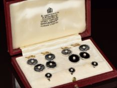 A 9ct white gold gentleman's dress shirt set comprising four studs, pair of cufflinks and three