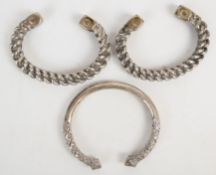 Three Indian white metal bangles, 238g