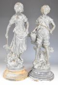 Two spelter figures of a boy carrying an urn and girl herding geese, height 46.5cm