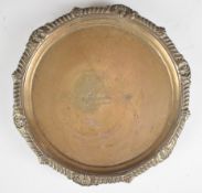 Georgian hallmarked silver salver with gadrooned edge, raise on three feet, marks rubbed but
