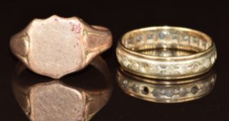 A 9ct rose gold signet ring and a 9ct gold eternity ring, 7.8g, sizes V & R