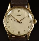 Longines 9ct gold gentleman's wristwatch ref. 13322 with gold hands and Arabic numerals, silver dial
