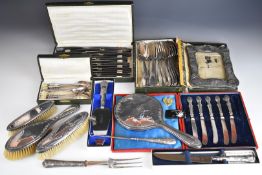 Hallmarked silver mounted items comprising photograph frame, hand mirror, three various brushes,