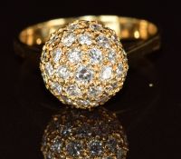 An 18ct gold ring set with diamonds in a sphere setting, 4.9g, size L