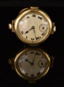 Unnamed 9ct gold ladies wristwatch with blued hands, black Roman numerals, silver dial and 15