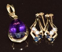 A 14k gold pendant set with a pear cut amethyst (2.6g) and a pair of 9ct gold earrings set with