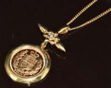 2002 limited edition 'flower' gold half sovereign in 9ct gold pendant mount set with a diamond, on