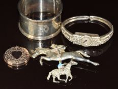 Hallmarked silver horse racing brooch, another silver horse racing brooch set with paste and enamel,