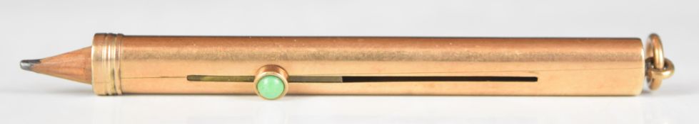Hallmarked 9ct gold pencil holder with turquoise cabochon button, in the manner of Mordan,