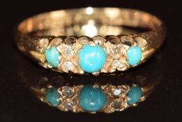 An 18ct gold ring set with three turquoise cabochons and four diamonds, Chester 1898, 2.1g, size L