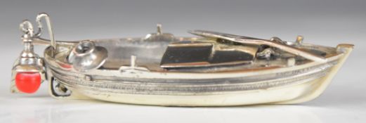 Novelty Italian silver model of a rowing boat, with marks to interior, length 8cm, weight 47g