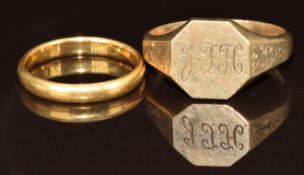 A 9ct gold signet ring (5.4g, size V) and a 22ct gold wedding band (3.2g, size M)