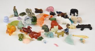 A large collection of miniature figures, fish, animals etc including jade / hardstone, agate, glass,