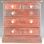 19th or early 20thC apprentice collector's chest of two over three drawers with ceramic handles, W34