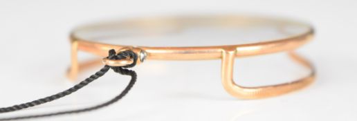 9ct gold framed magnifying glass, diameter 5cm