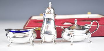 Elizabeth II hallmarked silver three piece cruet set with blue glass style liners, Birmingham