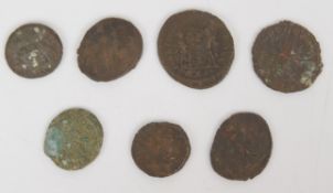 Seven radiate head Roman coins, largest 22mm, smallest 16mm