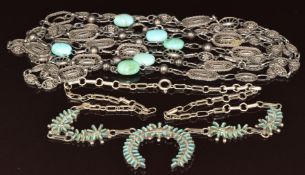 Navajo silver necklace set with turquoise and a silver necklace made up of filigree panels and