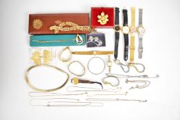 A collection of jewellery including Monet necklace, Trifari necklace, watches gold plated leaf