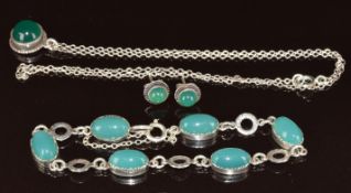 Silver Arts & Crafts bracelet set with green agate cabochons, with similar pendant and earrings,