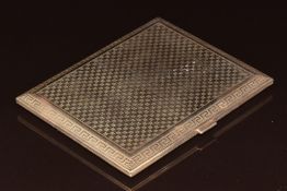 Art Deco 9ct gold cigarette case with engine turned decoration and Greek key border, London 1922,
