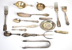 Hallmarked silver items including two tea strainers, embossed pin tray, fiddle and thread pattern