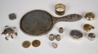 Hallmarked and other silver items to include hand mirror, napkin ring, four thimbles, button, four