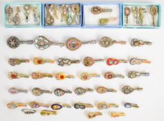 Over 45 micro mosaic brooches in the form of a guitars, banjos and mandolins