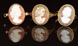 An 18ct gold ring (size M) and two 9ct gold rings, each set with a cameo, 7.2g, sizes O & S